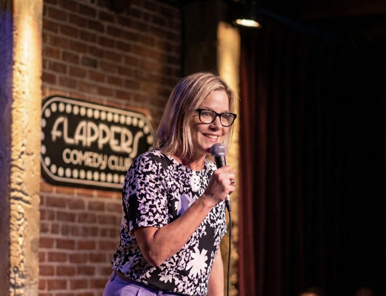 Misty McAfee performing stand-up at Flappers Comedy Club
